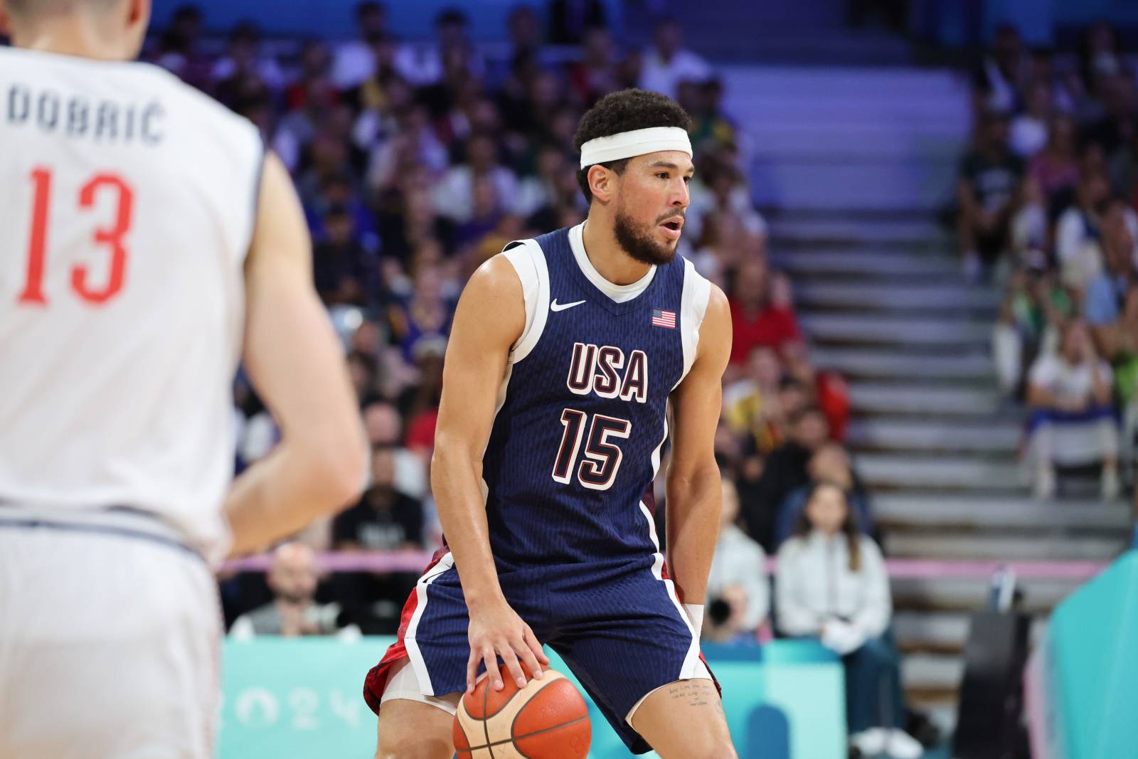 США начали защиту олимпийского золота с победы над Сербией